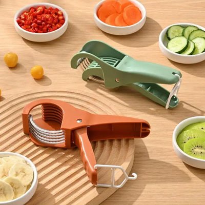 Coupe légumes portable manuel en orange et vert