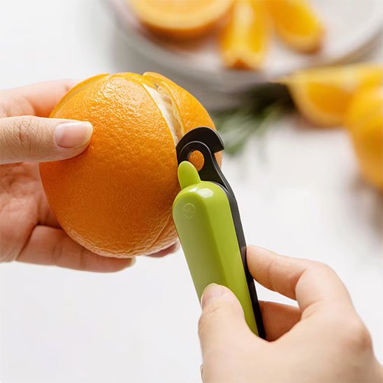 Eplucheur orange pour fruits et légumes