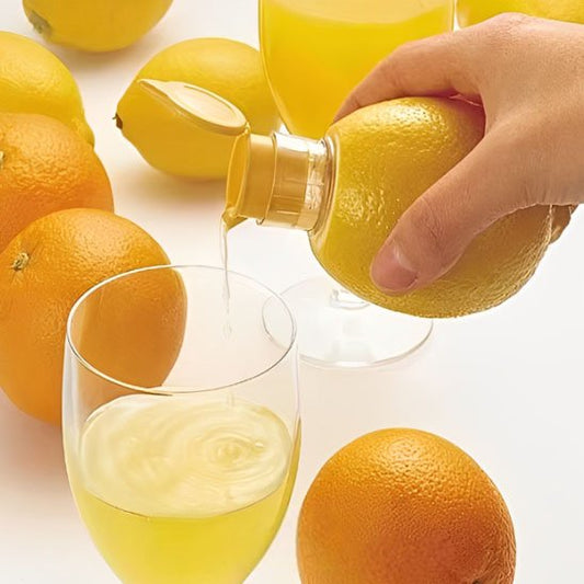 Presse agrume léger avec verre de jus de citron