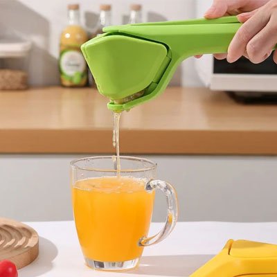 Presse agrume manuel avec orange