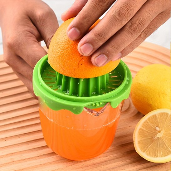 Presse agrume orange avec récipient
